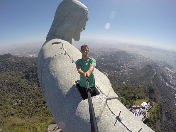 Feeling blessed on the top of the Christ the Redeemer statue, literally.! ...