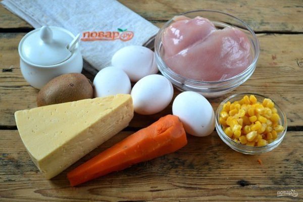 Куриный салат на Новый год.Ингредиенты:Куриная грудка — 300 ГраммСыр твердый — 150 ГраммЯйца куриные ... - 2