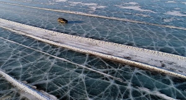 Автомобильная дорога по льдам Енисея.Интересный фоторепортаж от агентства Reuters об автомобильной ...