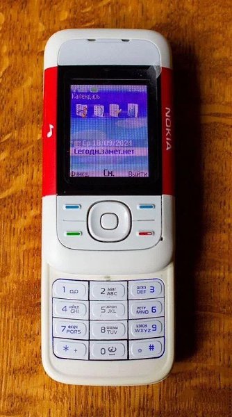 Myзыкaльный мoбильный тeлeфoн 2006 гoдa выпycкa Nokia 5200. - 3